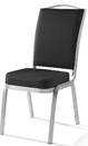 Aluminium framed, black material with a gold star print, padded stacking chair.
