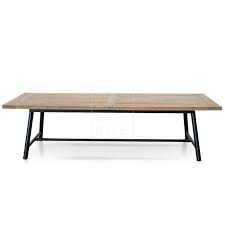 Walnut colour timber farm table with steel folding legs, 2500 x 1000 x 710 h Seating 4 people per side with one or two at the ends No table linen required for this rustic looking table